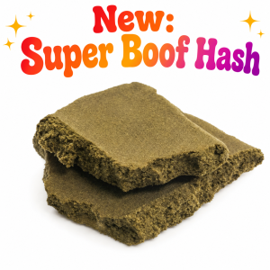 Golden Super Boof Hash cannabis concentrate with a smooth, resin-rich texture and crumbly interior displayed on a white background.