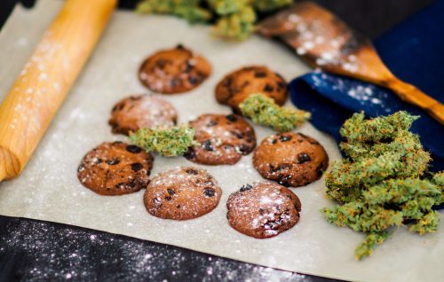 Freshly baked cannabis cookies made with cannabutter on a cooling rack